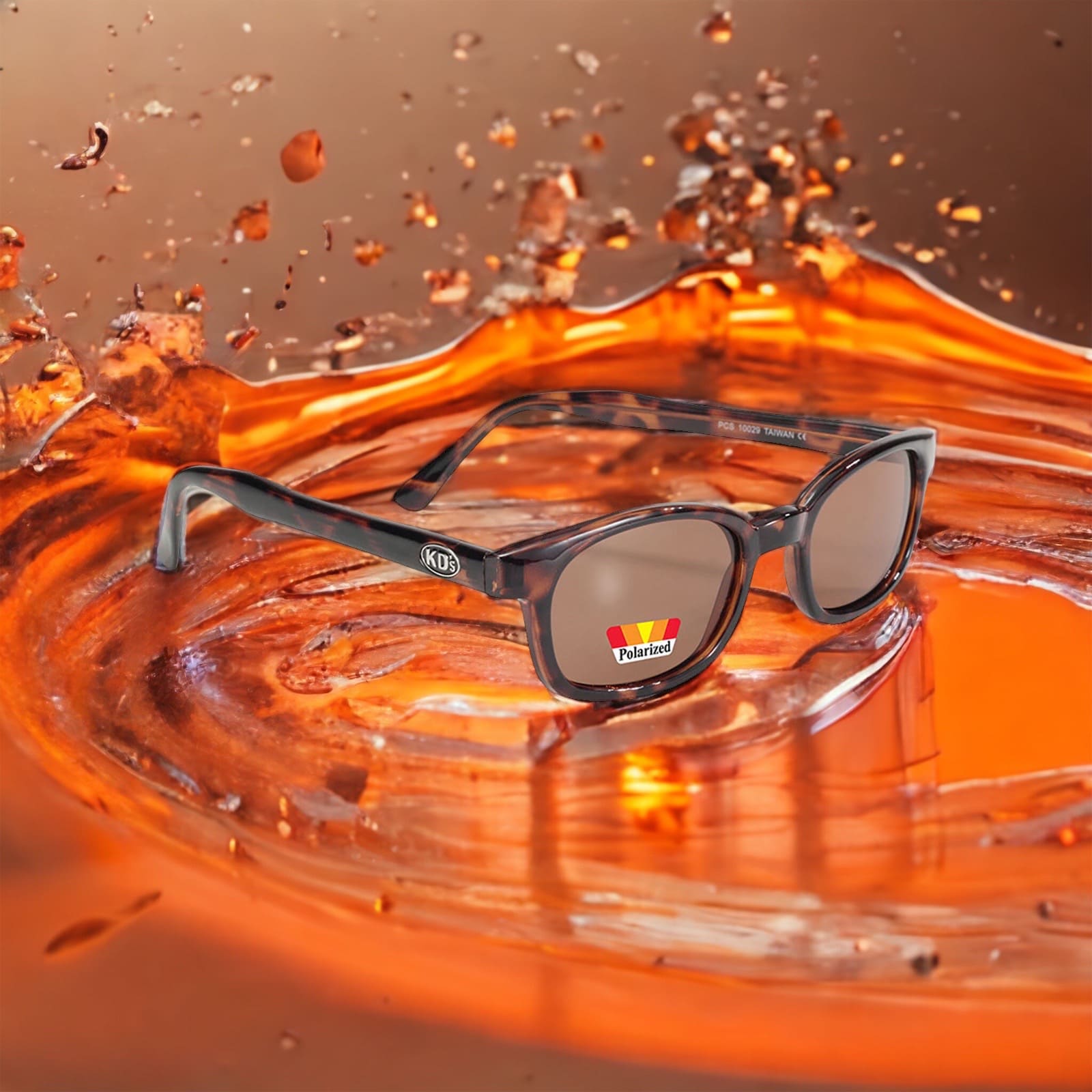 X-KD's 10029 large sunglasses with polarized amber polycarbonate lenses and a tortoise shell frame set in water.
